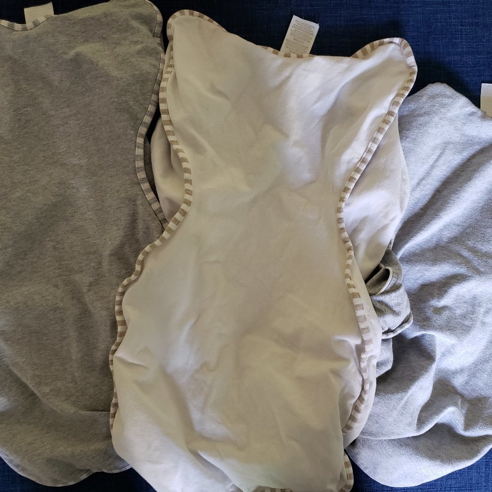 Three Swaddle Up swaddles, size small